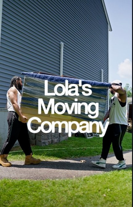 Lola's Moving Co. crew carrying a wrapped sofa down a Beacon Hill brownstone